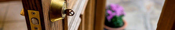 Front door with key in lock