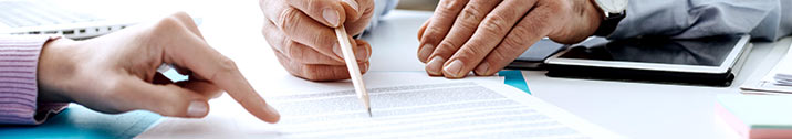 People going over insurance papers