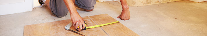 Man measuring wood
