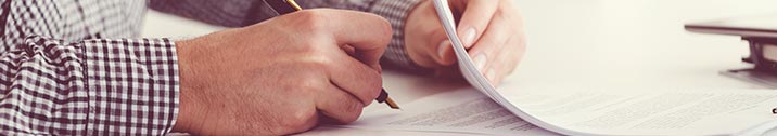 Man signing a document