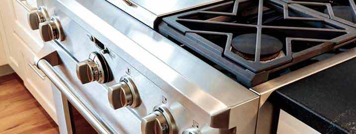 Stainless steel gas oven with black range