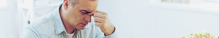 Stressed out man looking sad