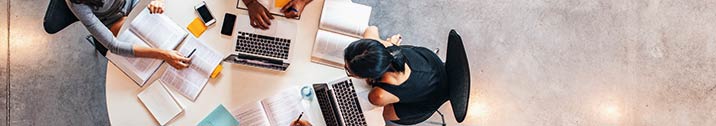 Students at a table studying