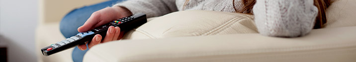 Woman holding a remote control