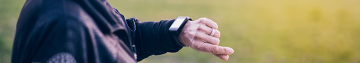 Woman looking at smart watch
