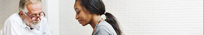 Young woman meeting with professor