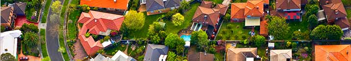 Aerial view of houses and lawns