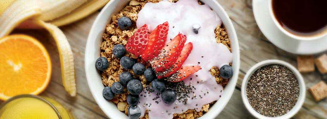 Bowl of fruit and granola