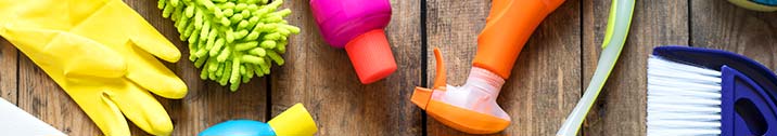 Cleaning supplies on wooden floor