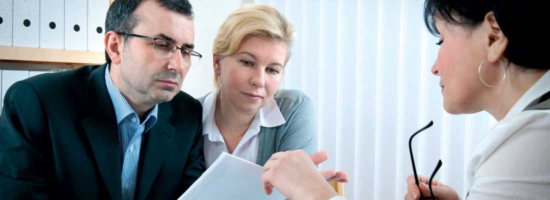 Couple meeting with lawyer