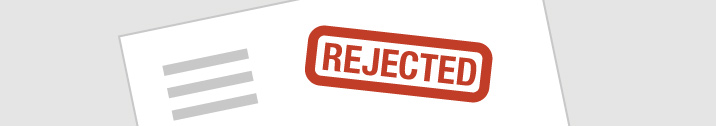 Document with rejection stamp