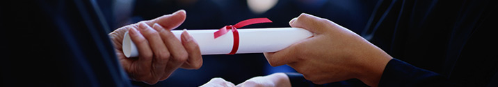 Graduate receiving diploma