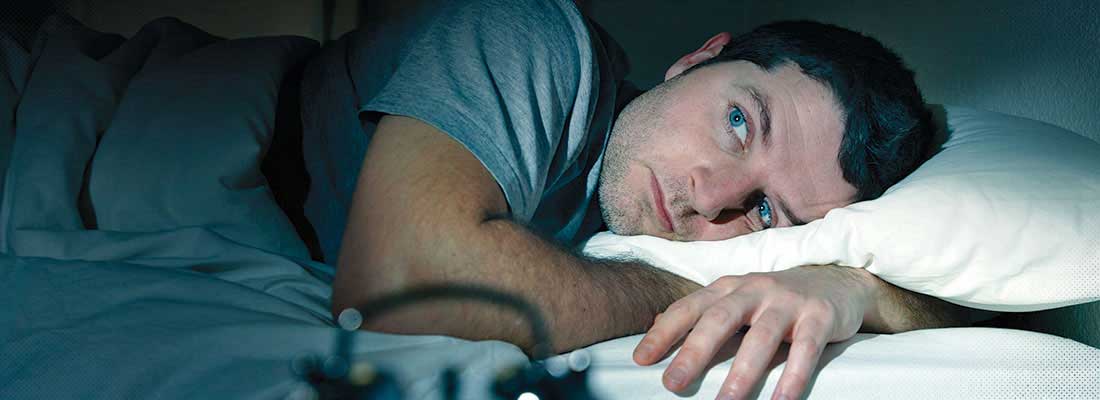 Man laying in bed
