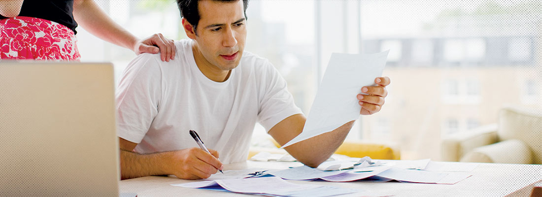 Man looking at finances