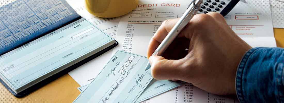 Man signing check
