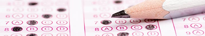 Multiple choice test sheet with pencil