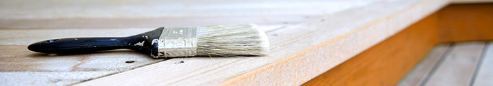 Paint brush on deck outside