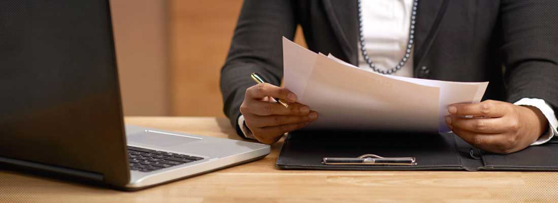 Person holding legal documents