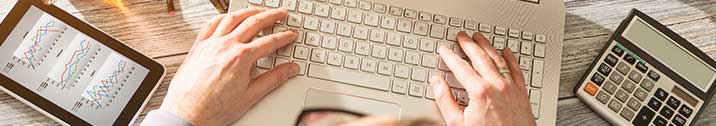 Person typing on laptop