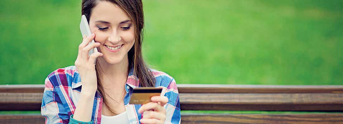 Woman holding credit card