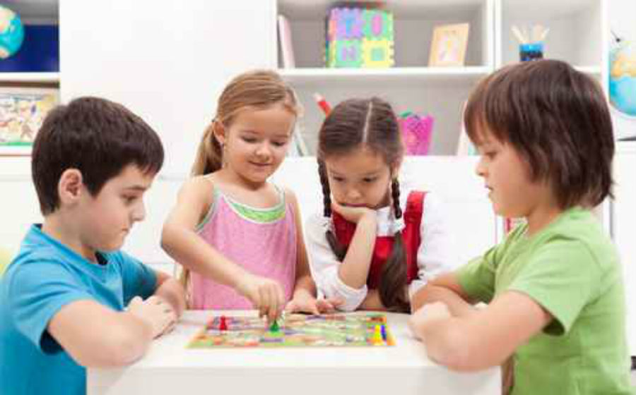 young people playing board games