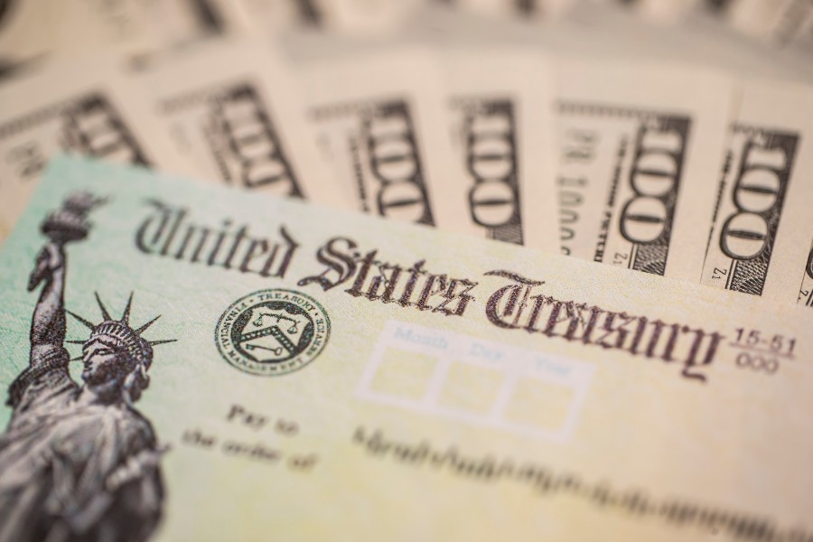 Stimulus checks to Americans reportedly back in $900 ...