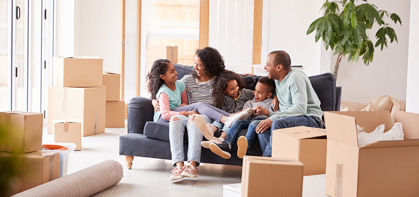 family gathered on couch