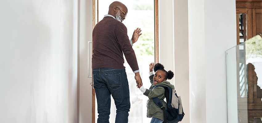 father and daughter waving goodbye