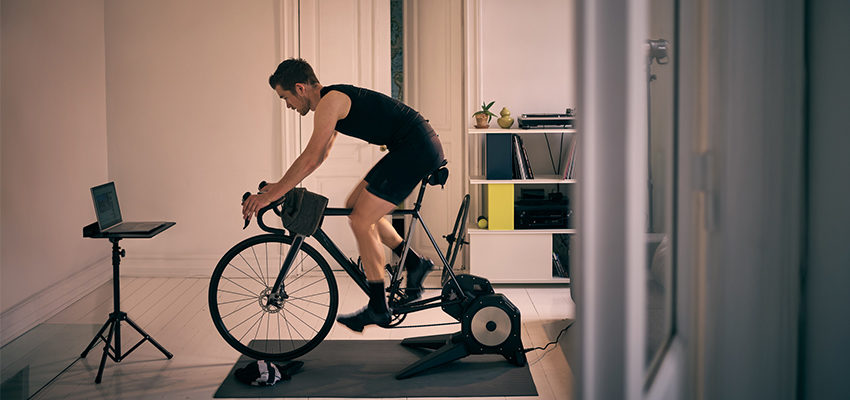 man working out on an exercise bike