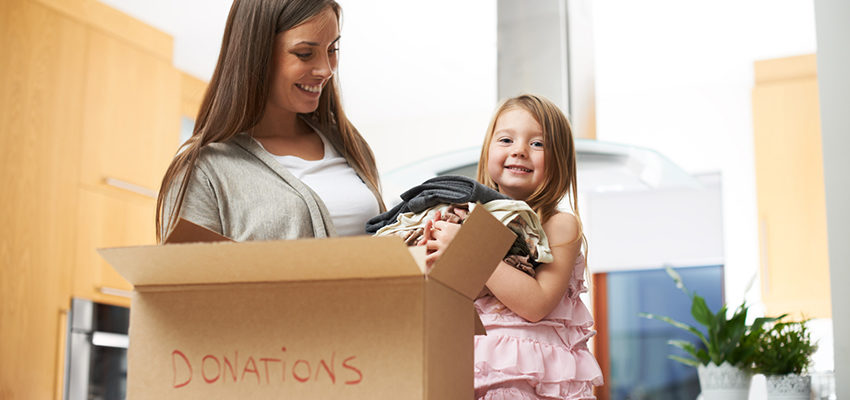 Mother and daughter give clothes