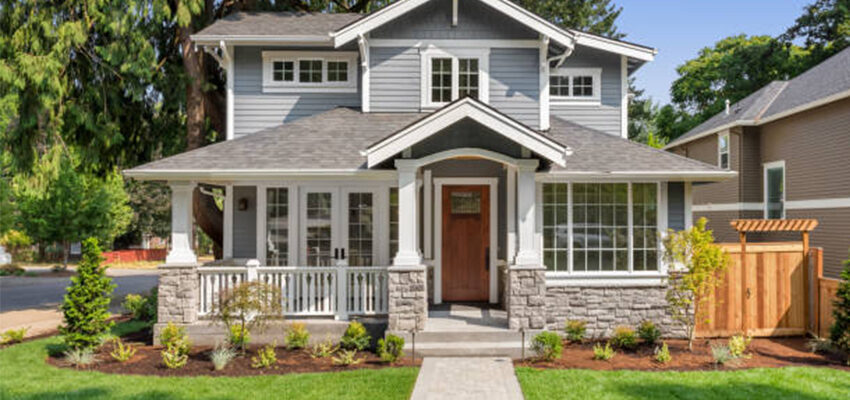 two story house with landscaping