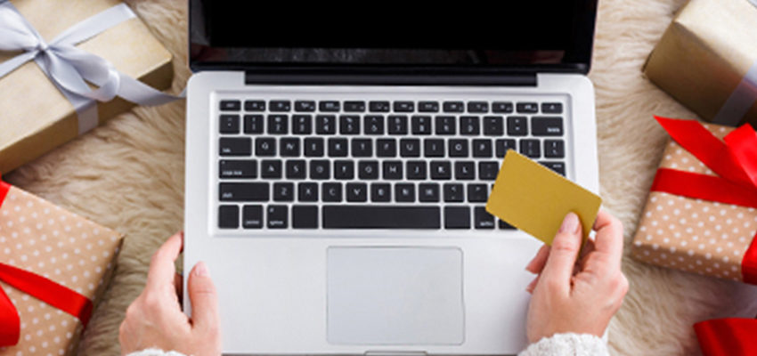 woman holiday shopping online