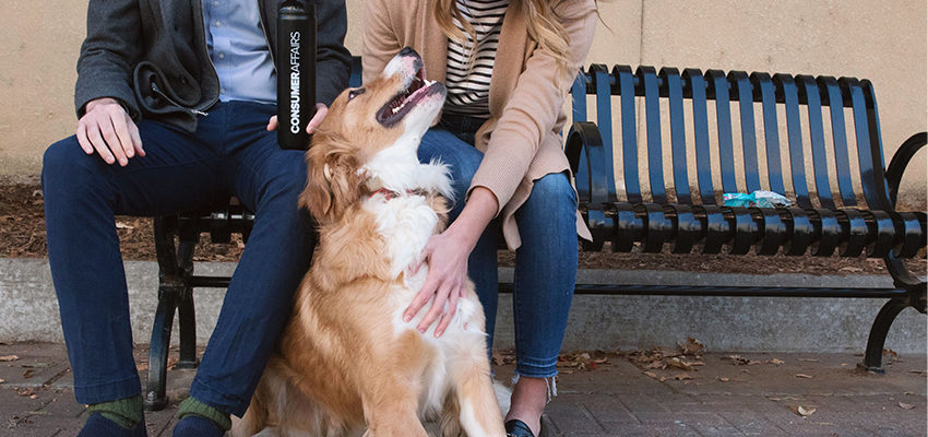woman petting dog