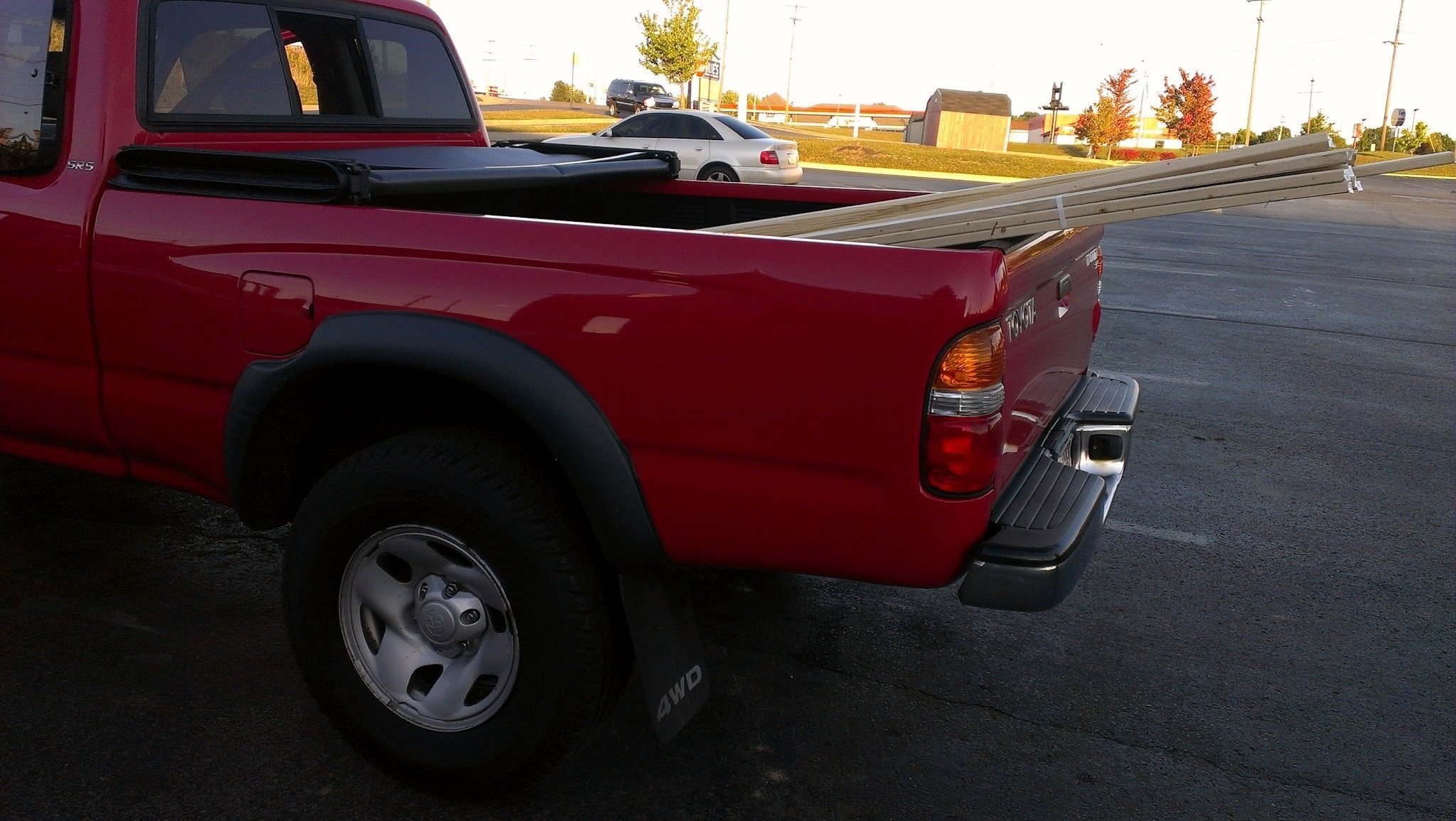How do you shift into four-wheel drive with a 2002 Toyota Tacoma?
