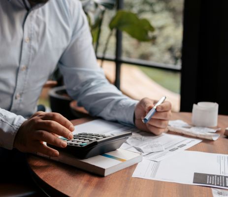 Person putting card in wallet