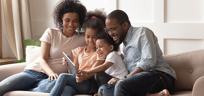 family enjoying their computer
